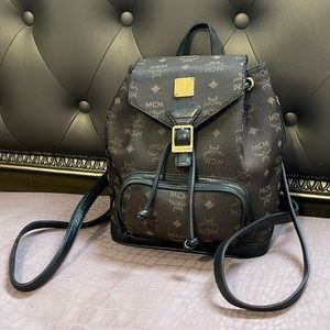 Authentic MCM small back pack sign of used inside no stain good condition